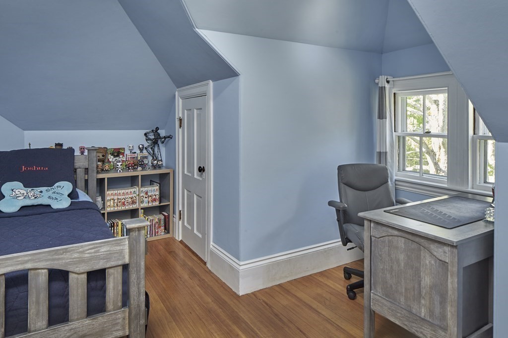 20 Orient Avenue Newton, MA 02459 - Photo 14 of 18 a view of a workspace with furniture and a window