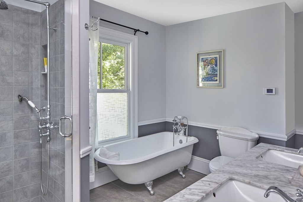 20 Orient Avenue Newton, MA 02459 - Photo 10 of 18 a spacious bathroom with a toilet a sink and shower