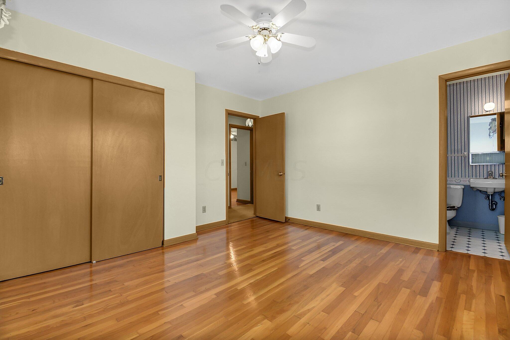 429 Amity Road Galloway, OH 43119 - Photo 15 of 27 1/2 bath off Suite/bedroom #3 with double closet and sliding doors.
