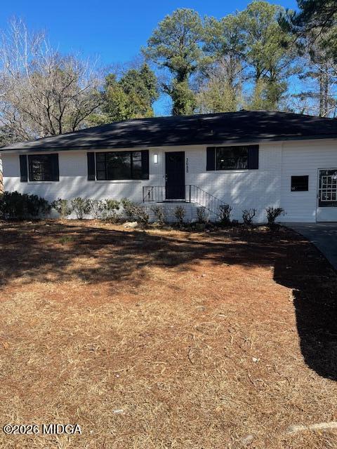 3688 Jessica Drive Macon, GA 31217 - Photo 2 of 14 a front view of a house with a yard