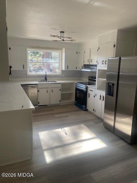 3688 Jessica Drive Macon, GA 31217 - Photo 6 of 14 a kitchen with a sink window and stainless steel appliances