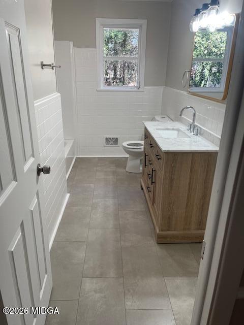 3688 Jessica Drive Macon, GA 31217 - Photo 8 of 14 a bathroom with a sink a toilet and a mirror
