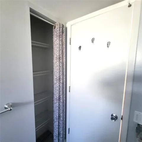 a swimming pool with outdoor seating and yard