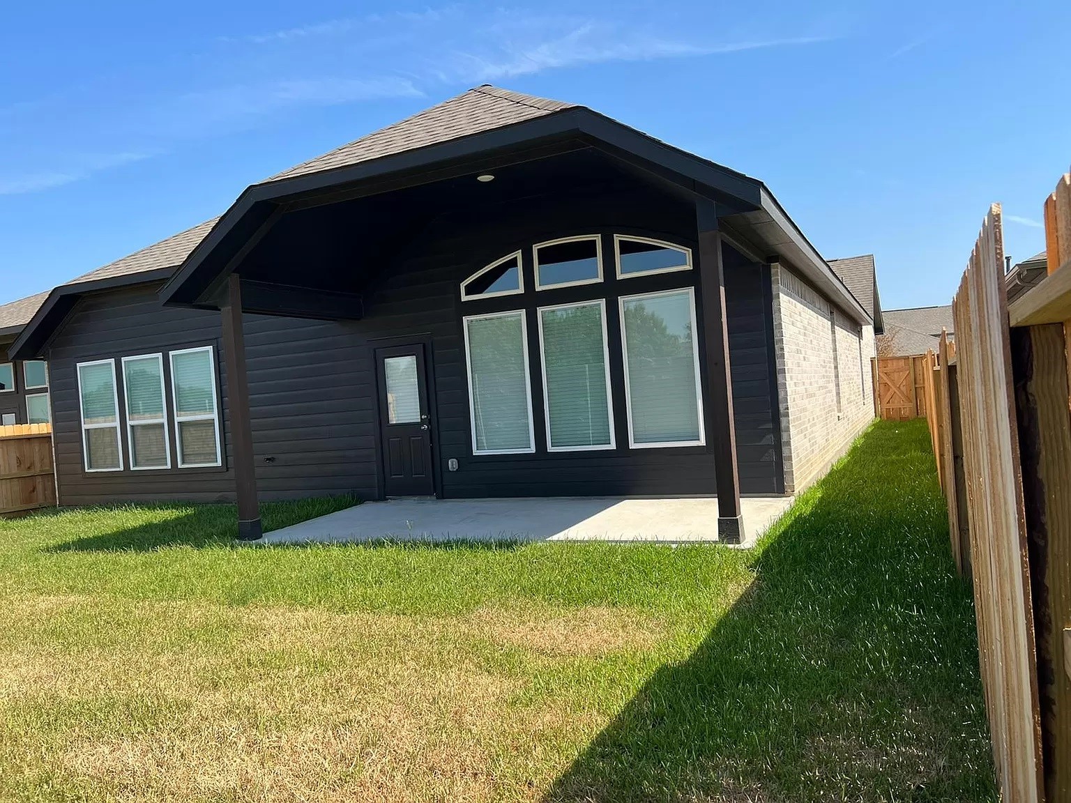 21219 Bering Reach Drive Cypress, TX 77433 - Photo 25 of 26 a front view of a house with a yard
