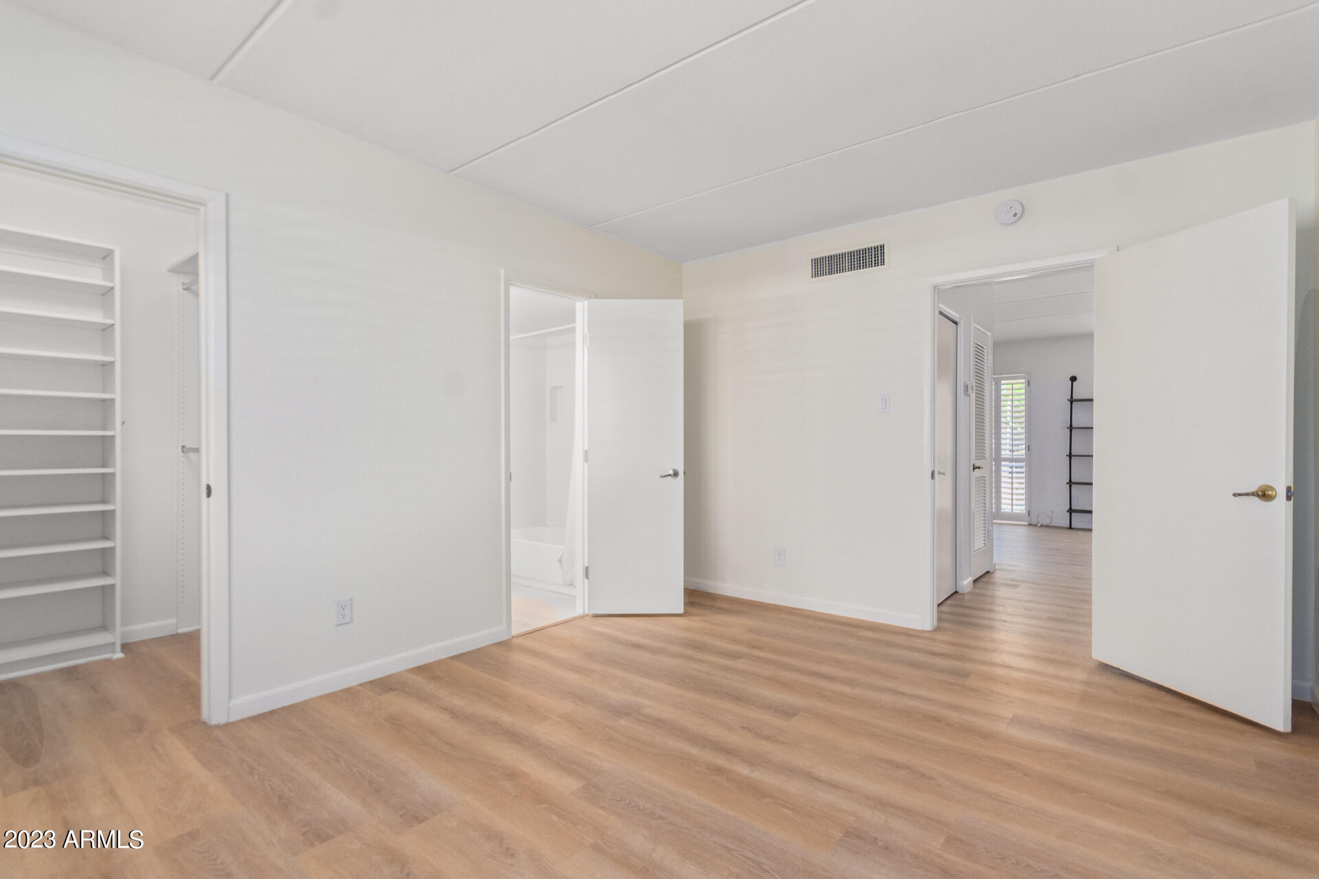 1024 East Osborn Road, Unit B Phoenix, AZ 85014 - Photo 13 of 21 a view of a room with wooden floor