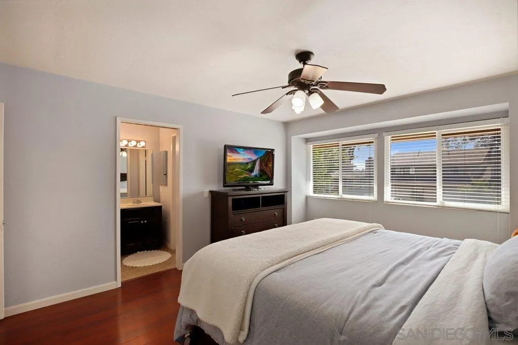 13547 Ridley Road San Diego, CA 92129 - Photo 16 of 24 a bedroom with a bed and a flat screen tv