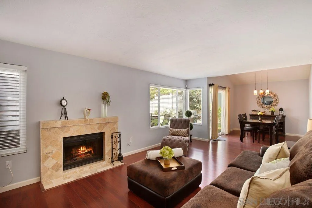 13547 Ridley Road San Diego, CA 92129 - Photo 4 of 24 a living room with furniture and a fireplace