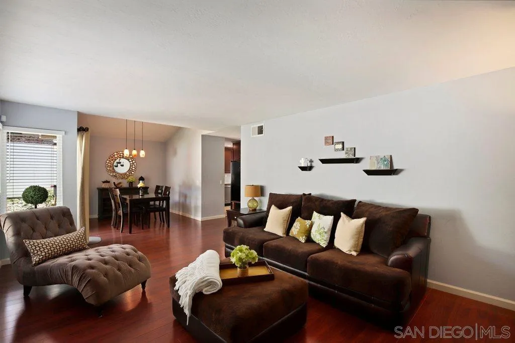 13547 Ridley Road San Diego, CA 92129 - Photo 5 of 24 a living room with furniture and wooden floor