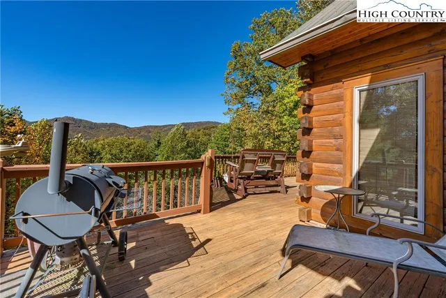a view of a balcony with chairs