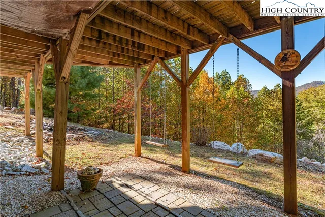 a view of a porch with a backyard