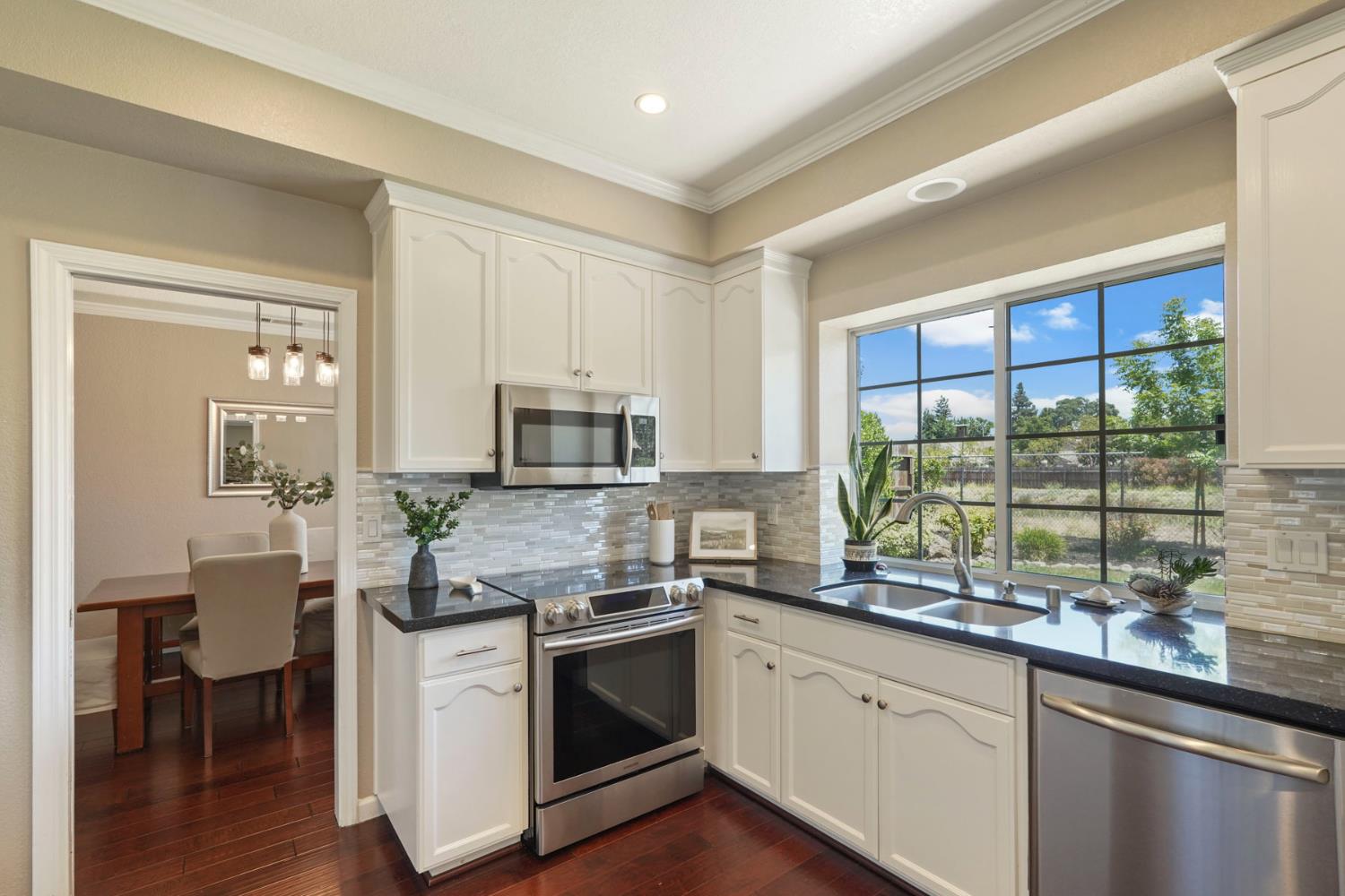 18432 Ironstone Street Woodbridge, CA 95258 - Photo 14 of 50 Meals are fun to create in this light and airy space.