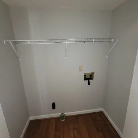 a view of a room with racks on the wall