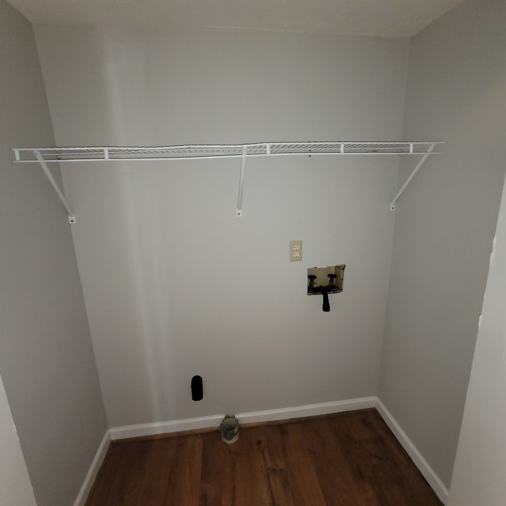 909 Washington Avenue, Unit 1 Columbus, GA 31906 - Photo 10 of 10 a view of a room with racks on the wall