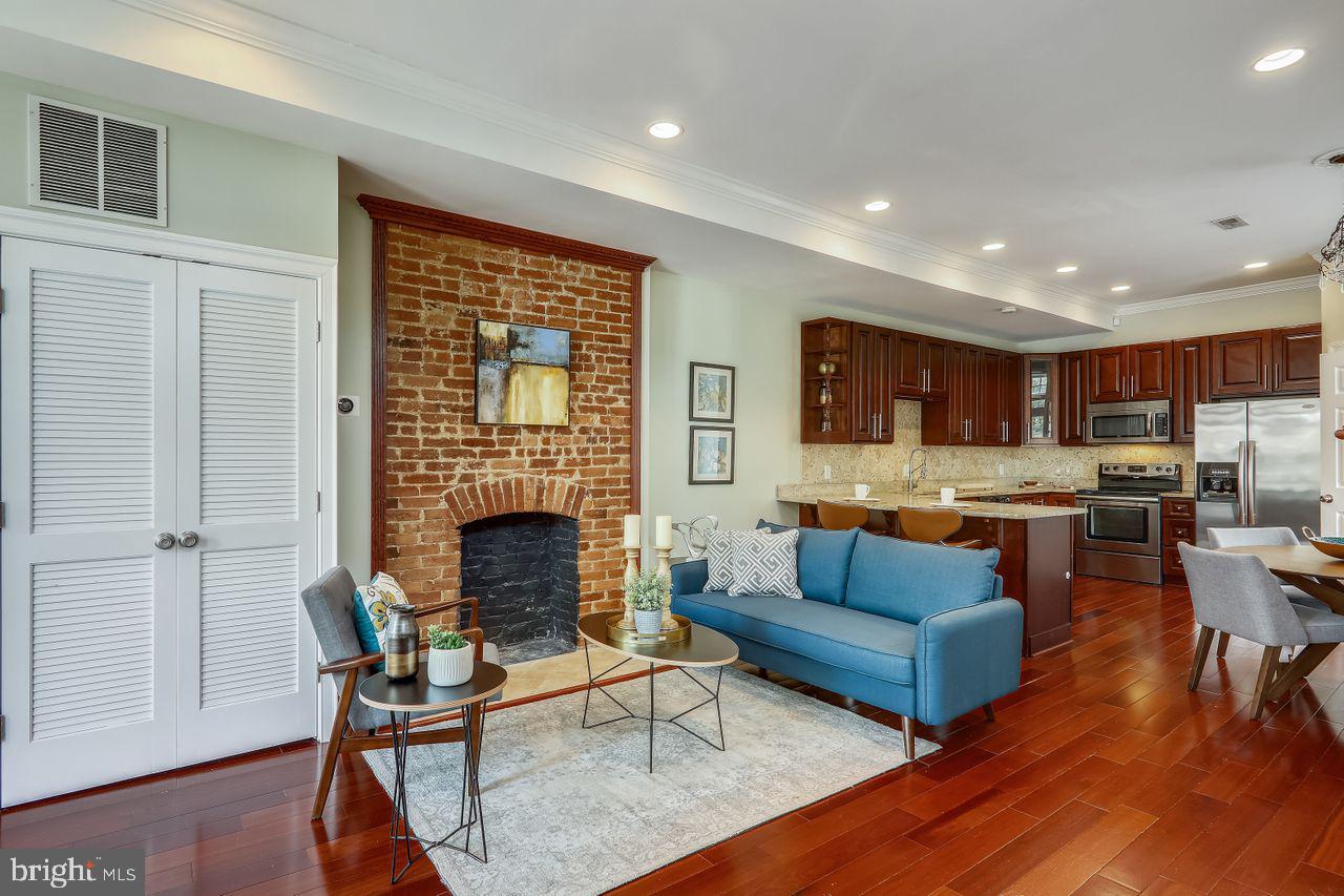 834 7th Street Northeast Washington, DC 20002 - Photo 2 of 32 Exposed Brick Chimney and Flowing First Floor