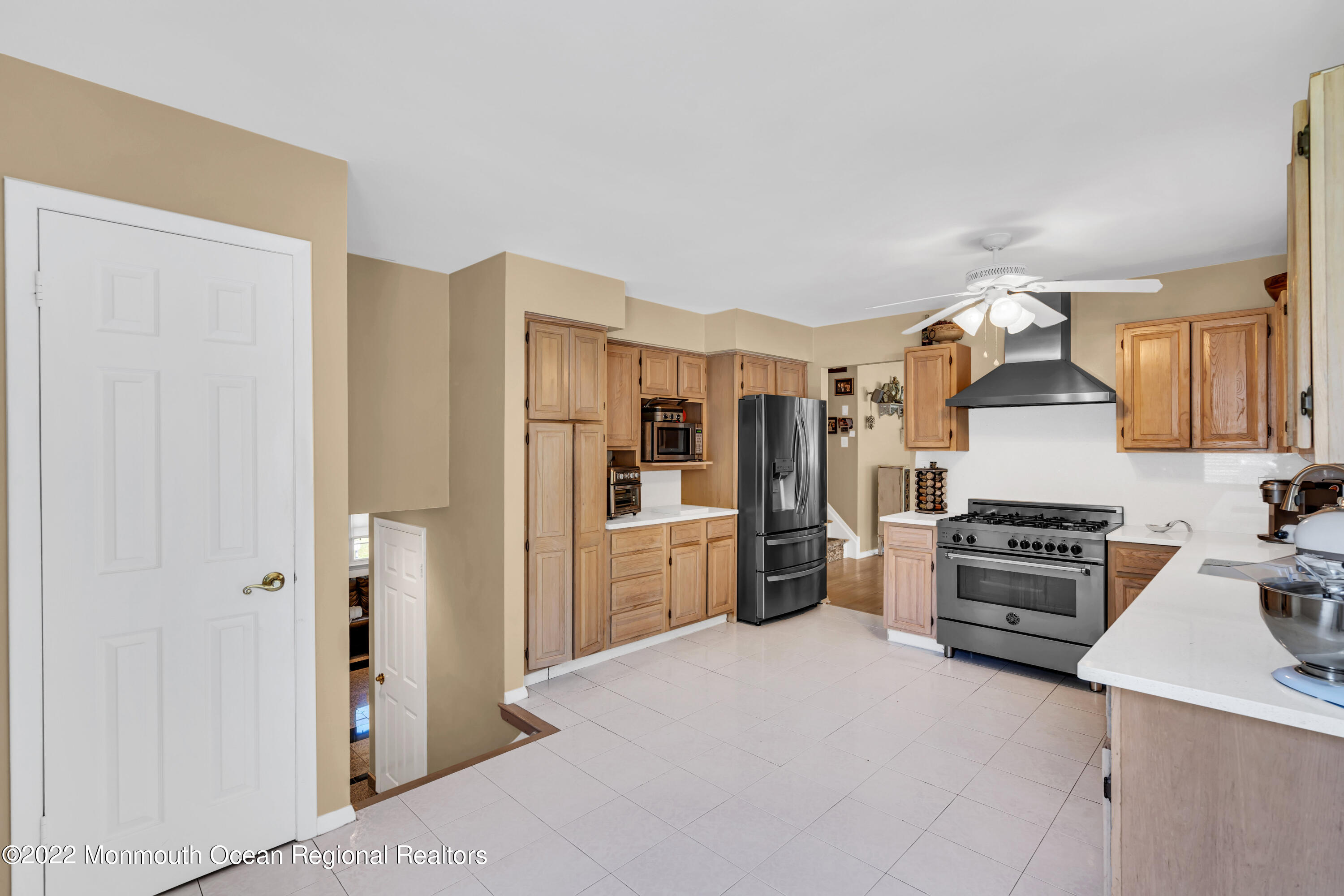 23 North Westfield Road Howell, NJ 07731 - Photo 11 of 55 a kitchen with a refrigerator and a stove top oven