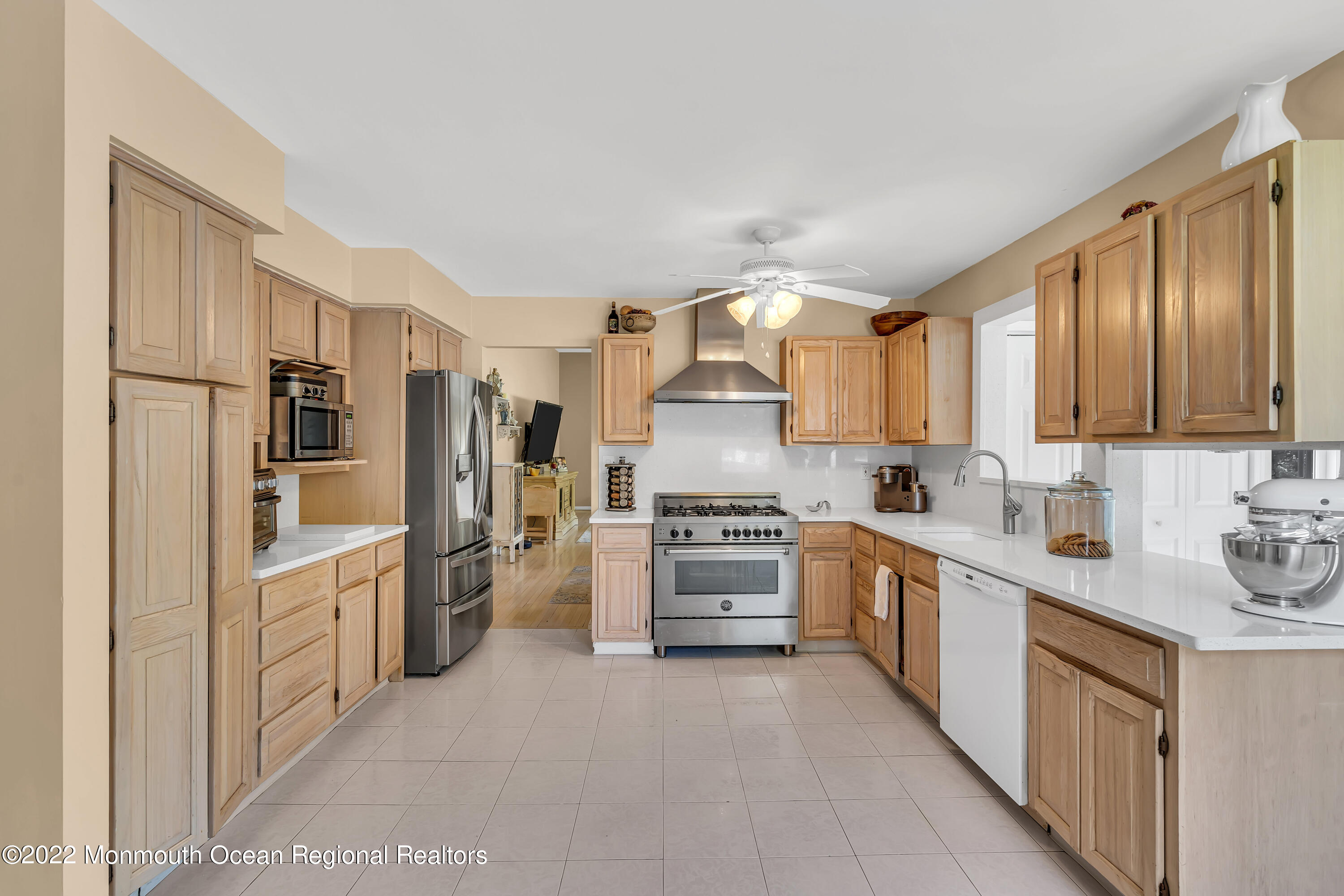 23 North Westfield Road Howell, NJ 07731 - Photo 13 of 55 a kitchen with stainless steel appliances granite countertop a refrigerator stove top oven and sink