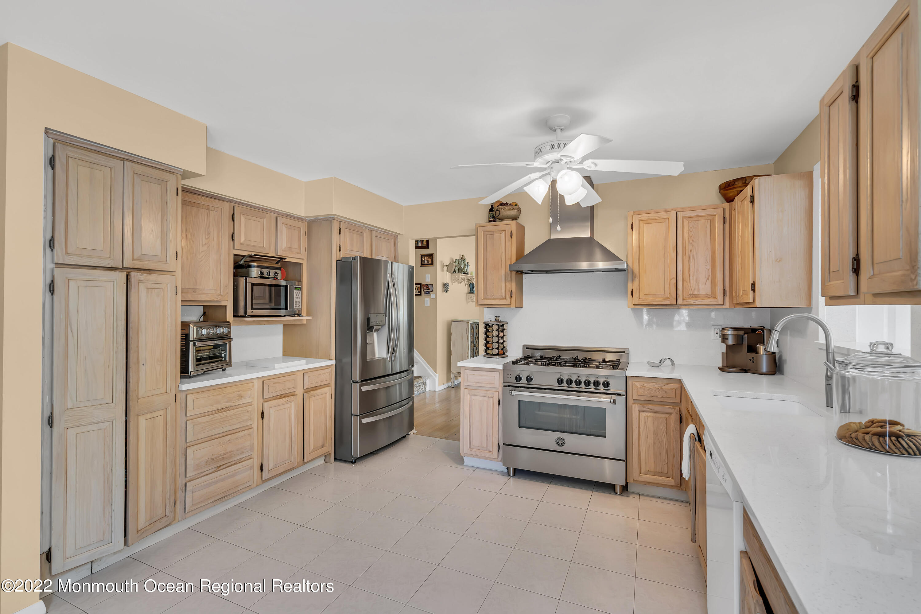 23 North Westfield Road Howell, NJ 07731 - Photo 14 of 55 a kitchen with cabinets and stainless steel appliances