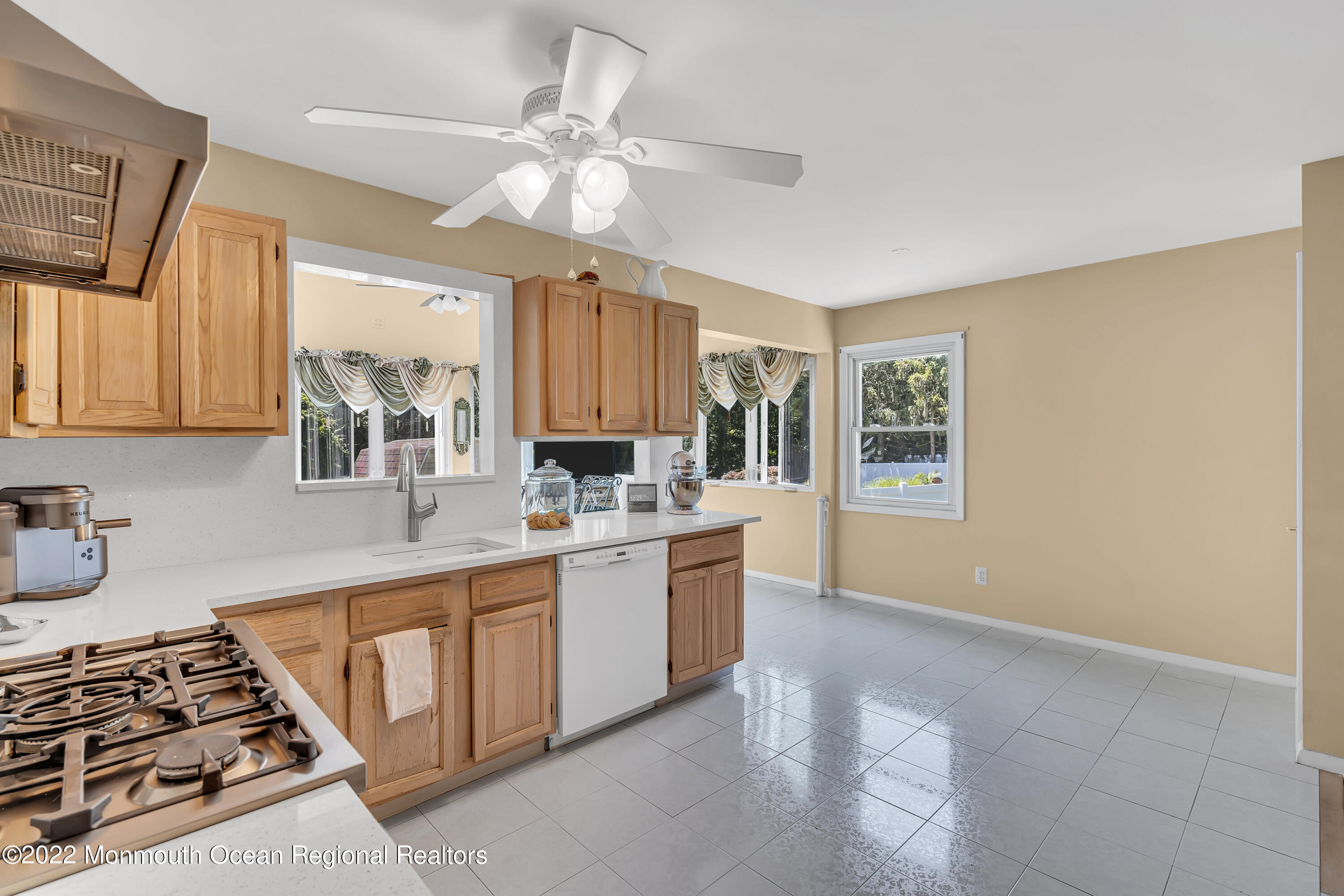 23 North Westfield Road Howell, NJ 07731 - Photo 16 of 55 a kitchen with a stove a sink and a refrigerator
