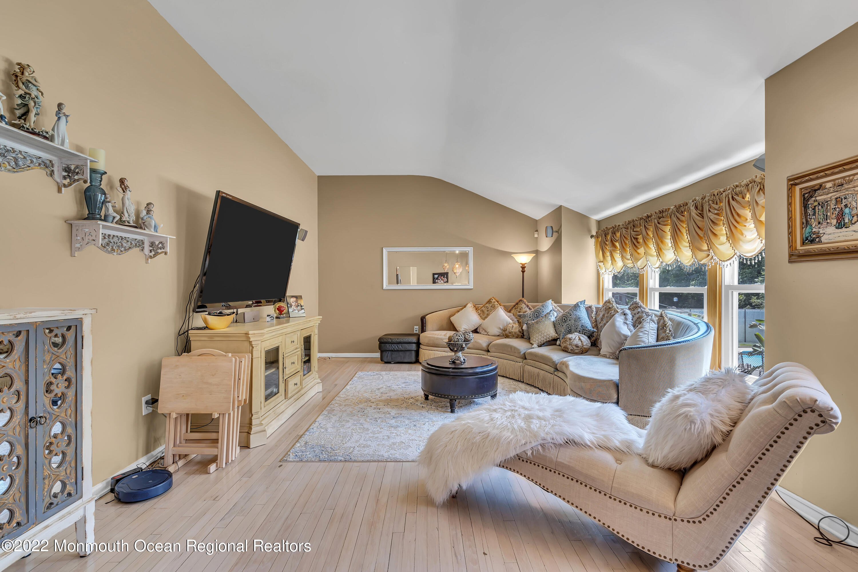 23 North Westfield Road Howell, NJ 07731 - Photo 23 of 55 a living room with furniture and a flat screen tv