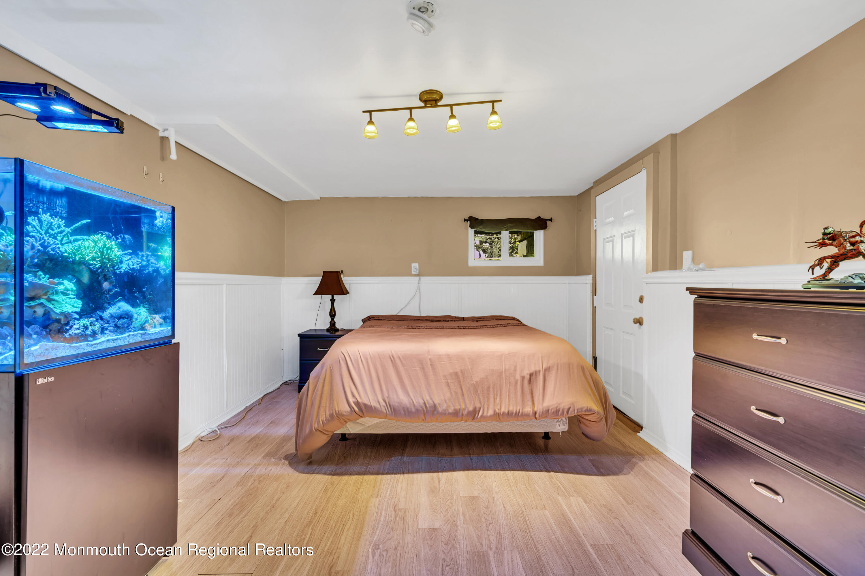 23 North Westfield Road Howell, NJ 07731 - Photo 39 of 55 a bedroom with a bed and a painting on the wall