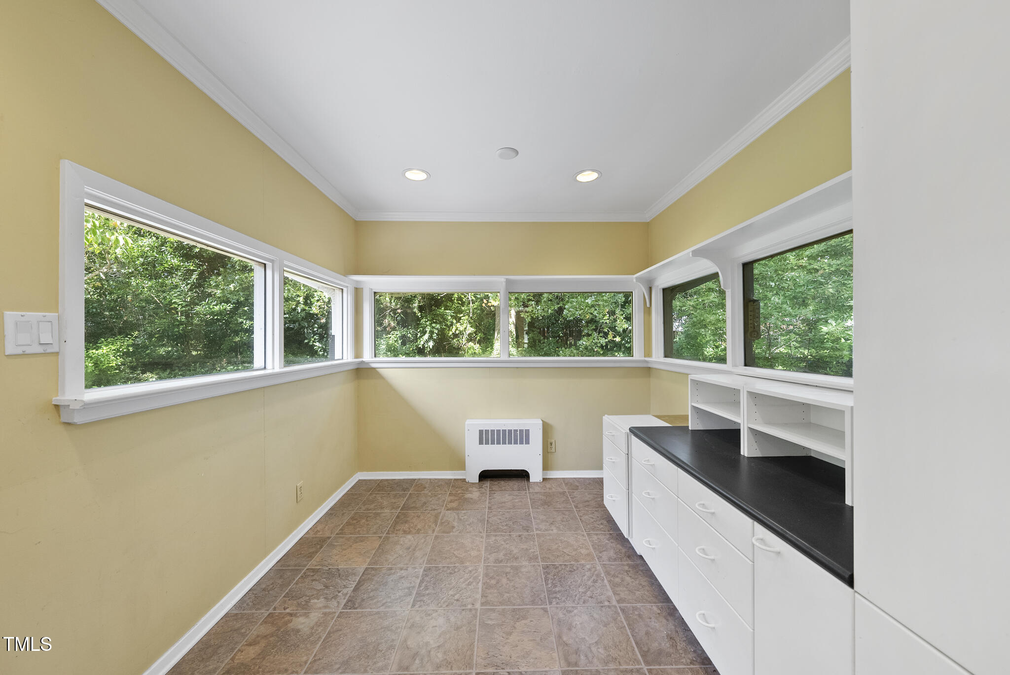 825 Woodburn Road Raleigh, NC 27605 - Photo 21 of 35 a view of a room with a large window