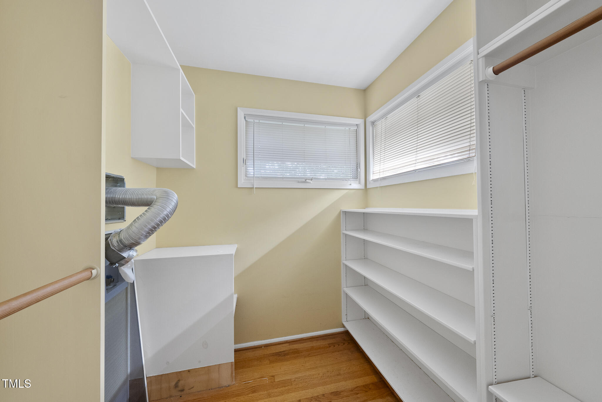 825 Woodburn Road Raleigh, NC 27605 - Photo 30 of 35 a view of walk in closet with empty racks