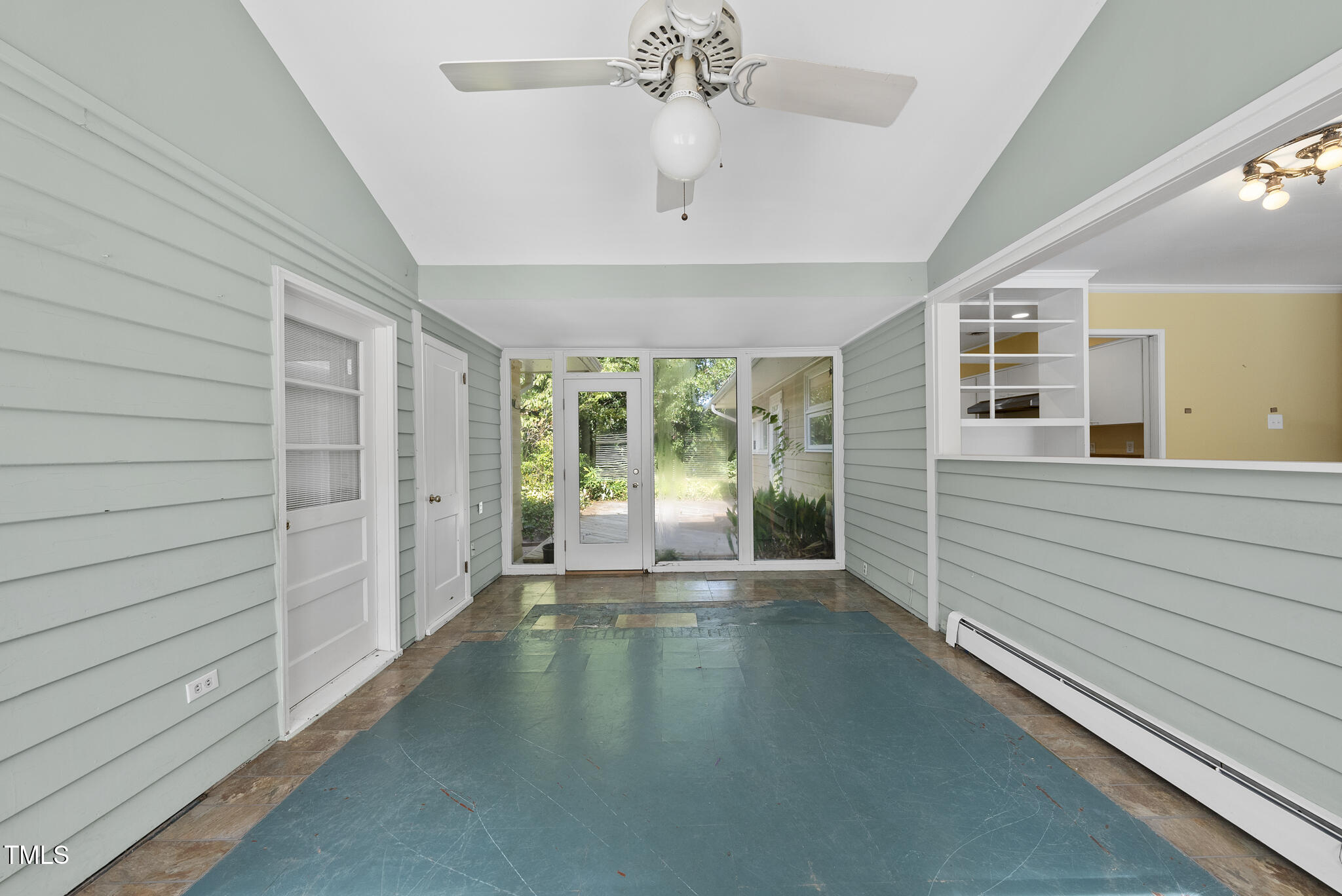 825 Woodburn Road Raleigh, NC 27605 - Photo 33 of 35 a view of a hallway with a large window