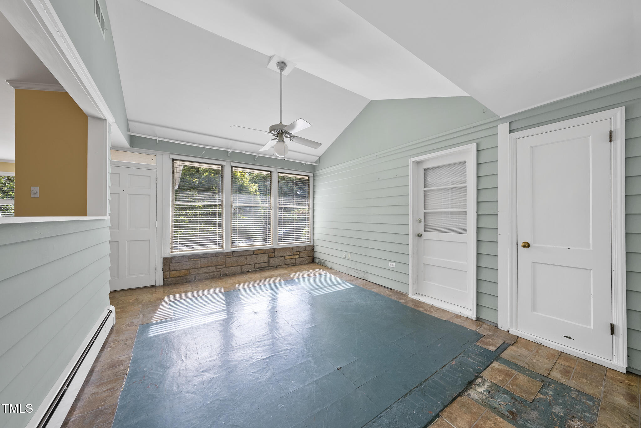825 Woodburn Road Raleigh, NC 27605 - Photo 34 of 35 wooden floor in an empty room with a window