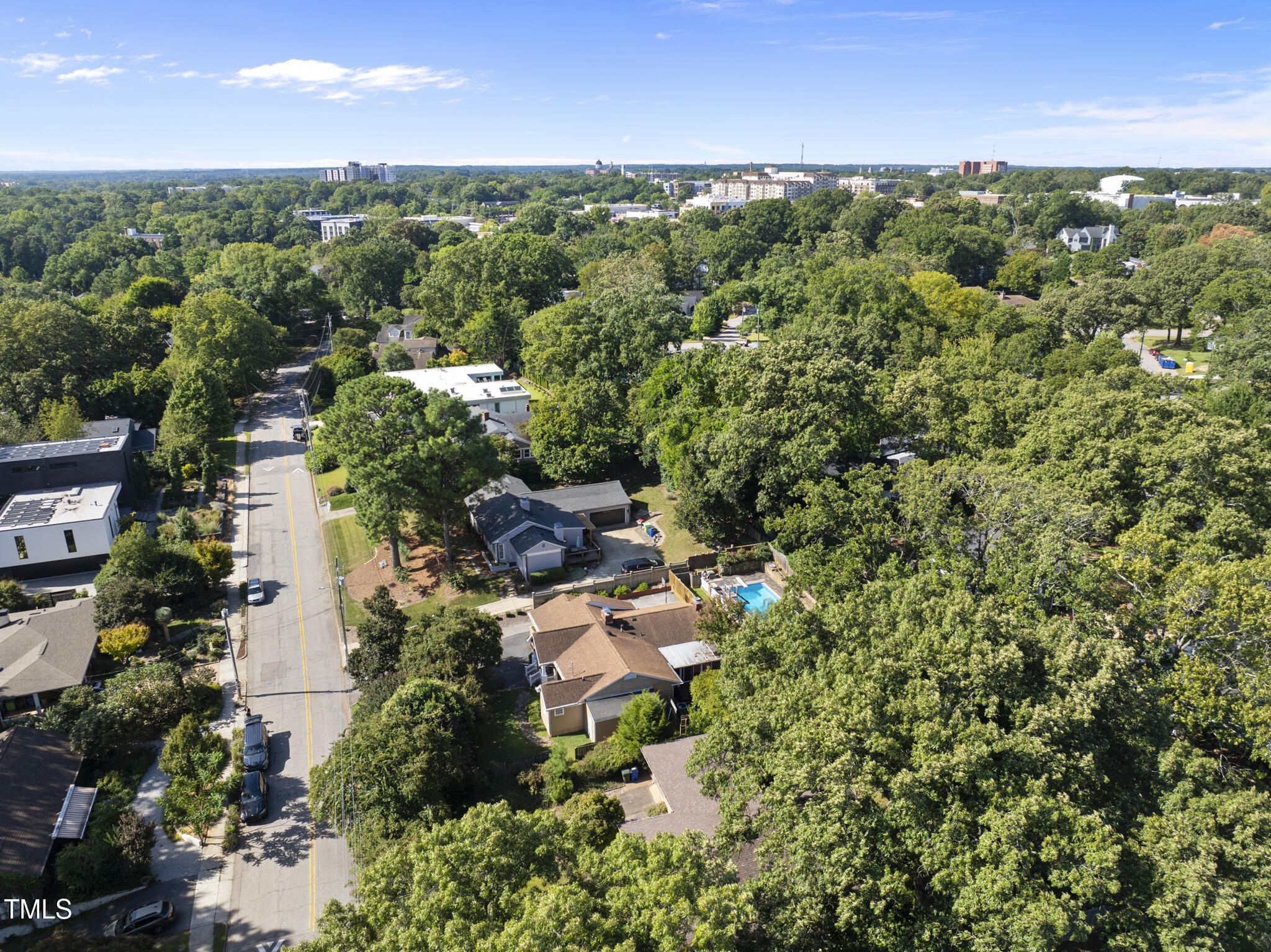 825 Woodburn Road Raleigh, NC 27605 - Photo 5 of 35 an aerial view of residential house with outdoor space and trees all around