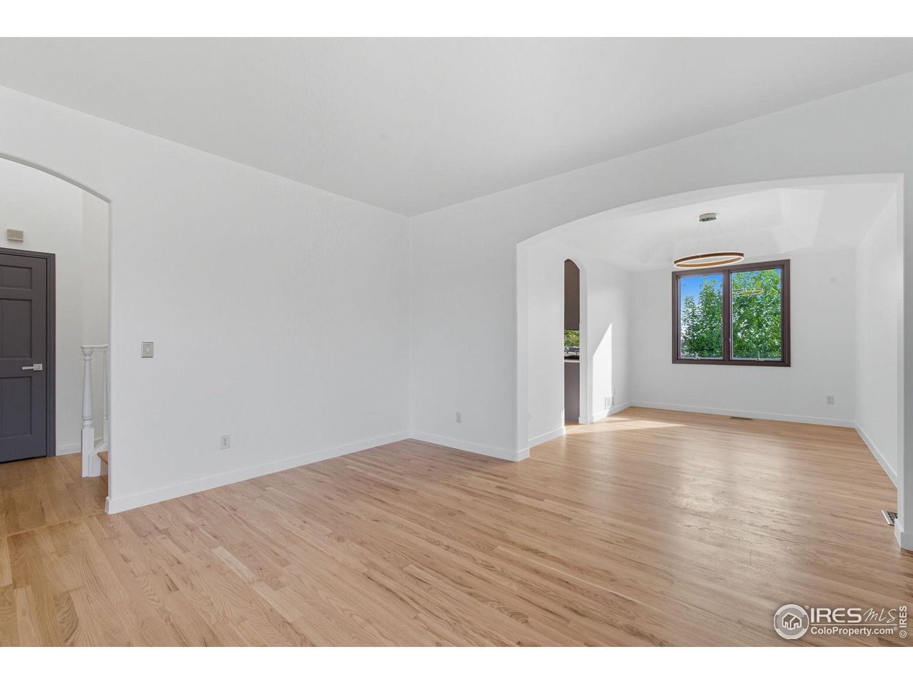 4624 South Hampton Circle Boulder, CO 80301 - Photo 8 of 44 Foyer Leading to Living Room and Dining Room w/ New Wood Floors