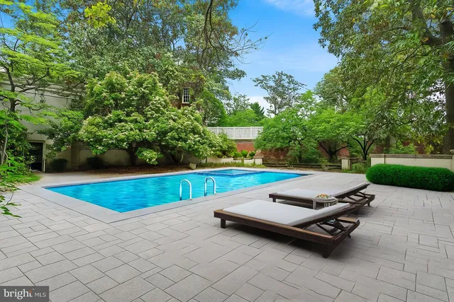 a bench sitting in the middle of a park