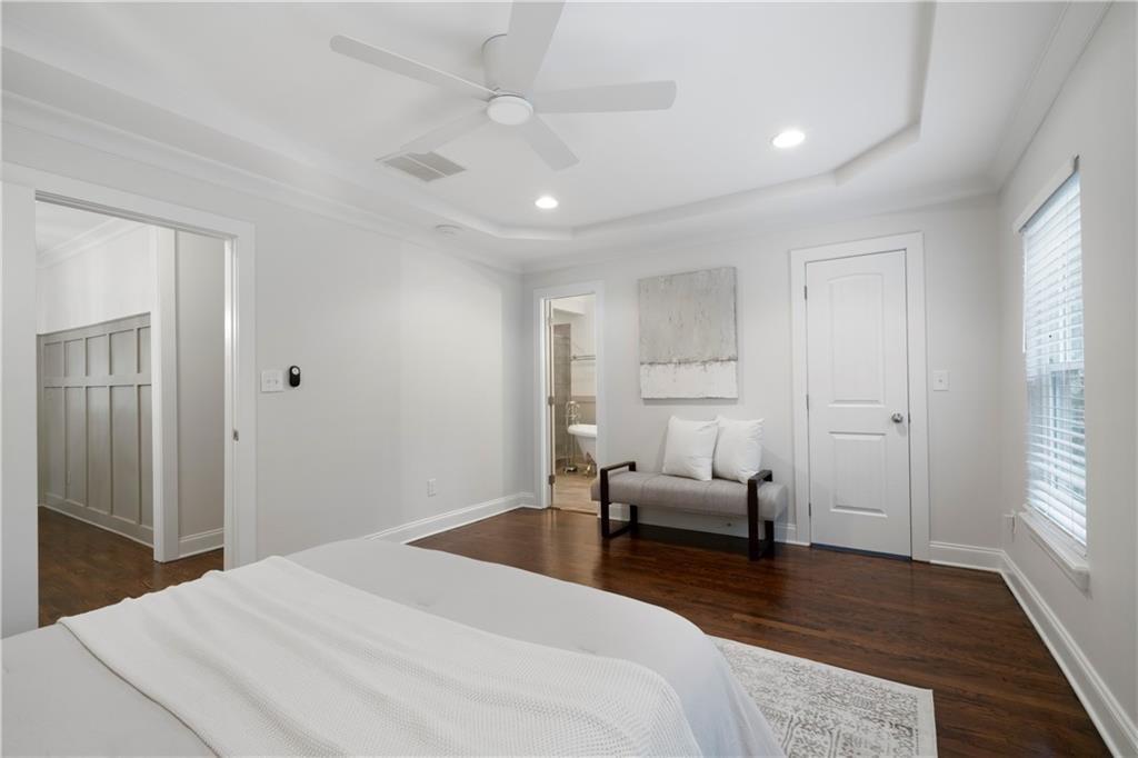 1045 Moreland Avenue Southeast Atlanta, GA 30316 - Photo 17 of 28 a bedroom with a bed and furniture