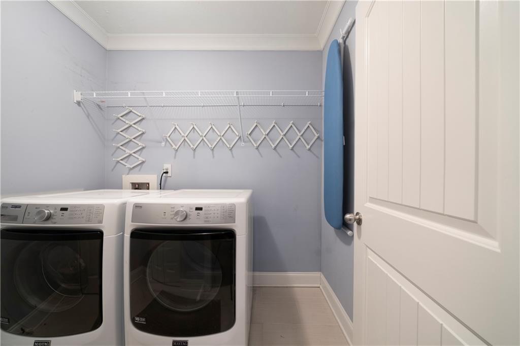 1045 Moreland Avenue Southeast Atlanta, GA 30316 - Photo 24 of 28 a utility room with dryer and washer