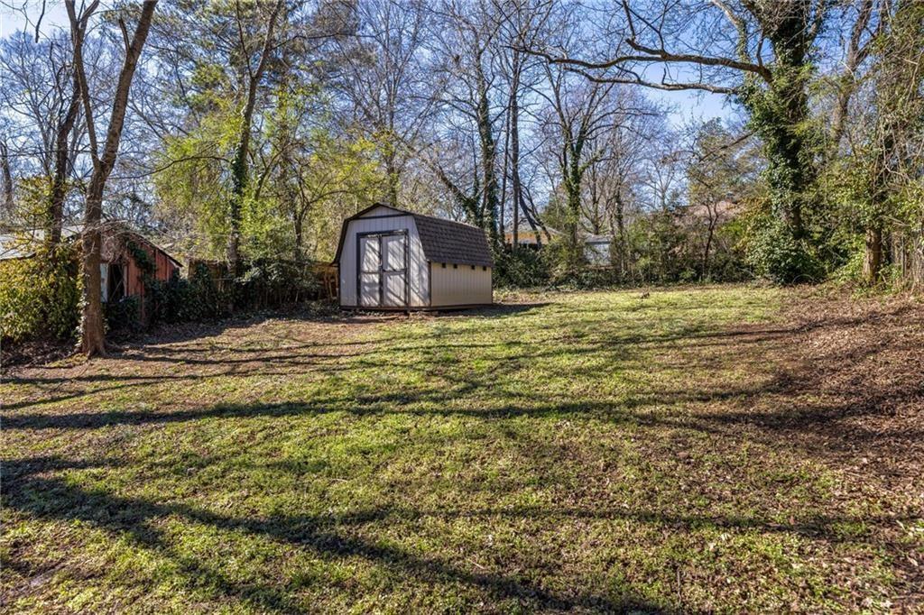 1045 Moreland Avenue Southeast Atlanta, GA 30316 - Photo 26 of 28 a large tree in the middle of a field