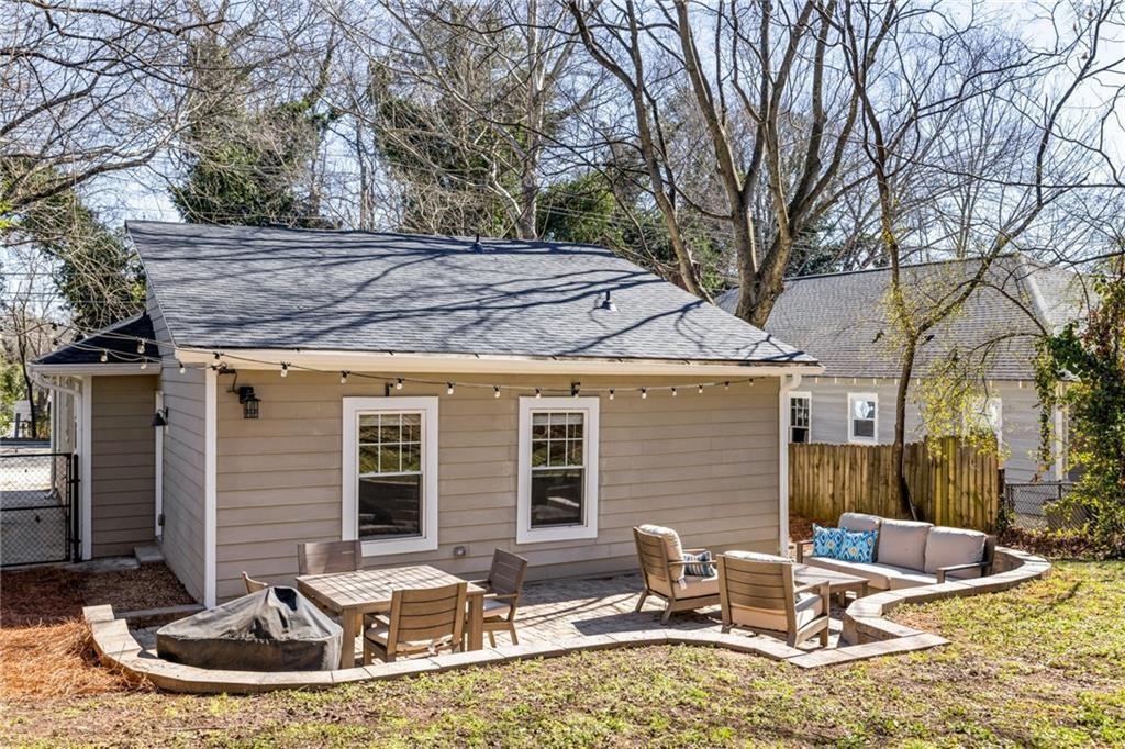 1045 Moreland Avenue Southeast Atlanta, GA 30316 - Photo 27 of 28 a backyard of house with outdoor seating