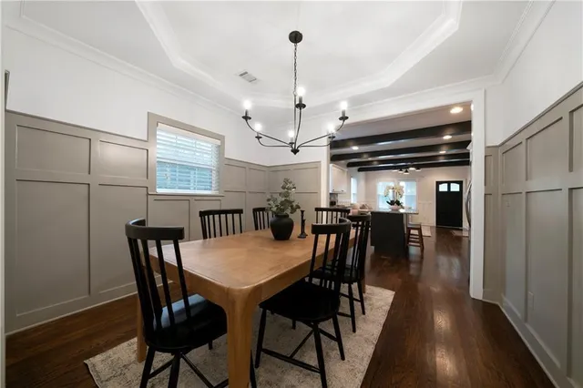 a view of a dining room with furniture