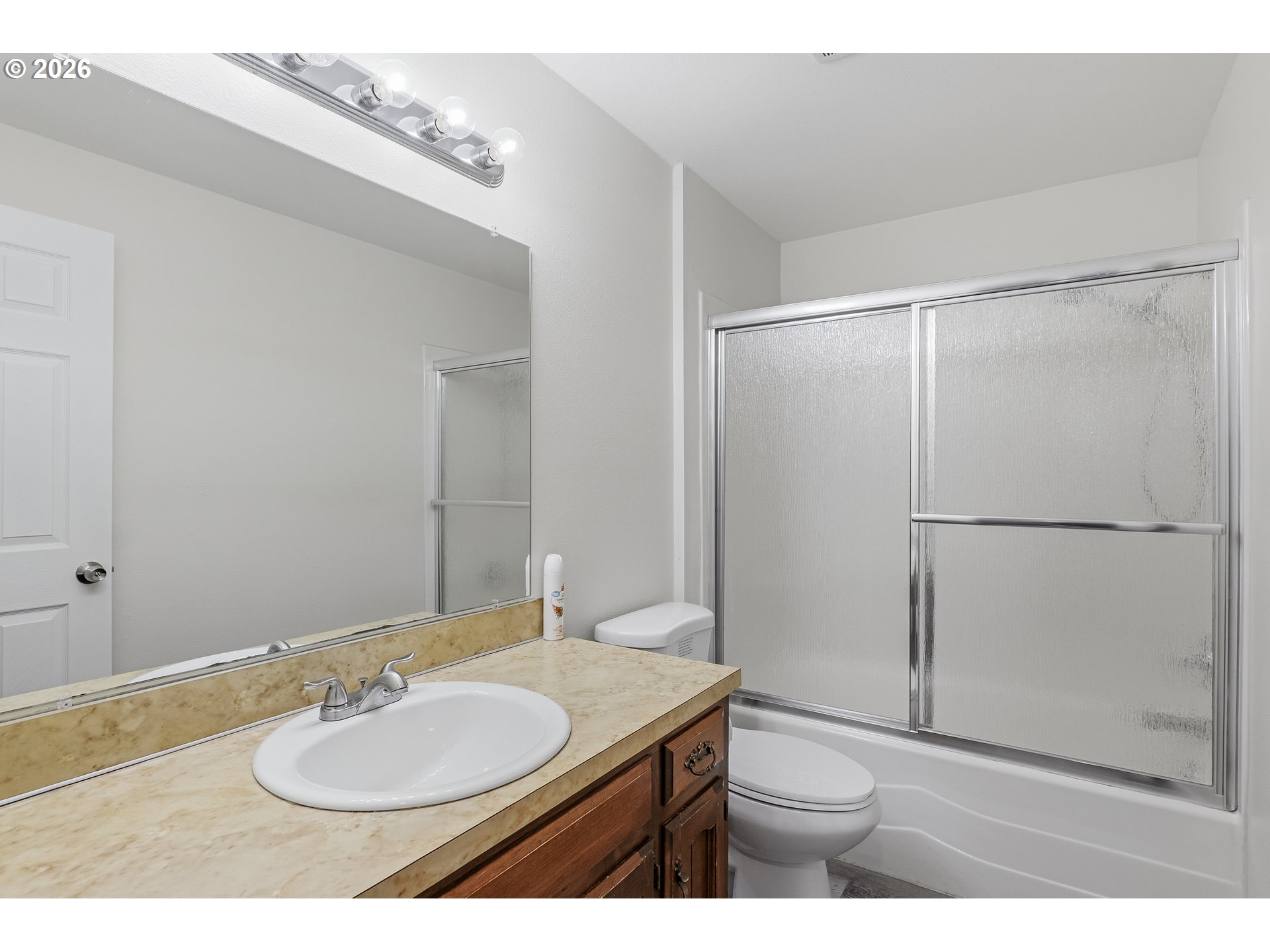 818 Chehalis Place North Keizer, OR 97303 - Photo 12 of 20 a bathroom with a granite countertop sink toilet and shower
