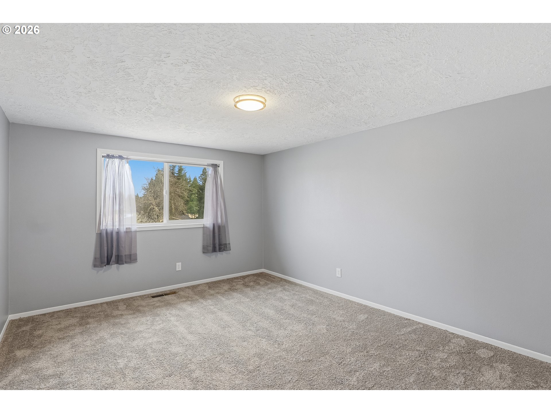 818 Chehalis Place North Keizer, OR 97303 - Photo 8 of 20 an empty room with windows