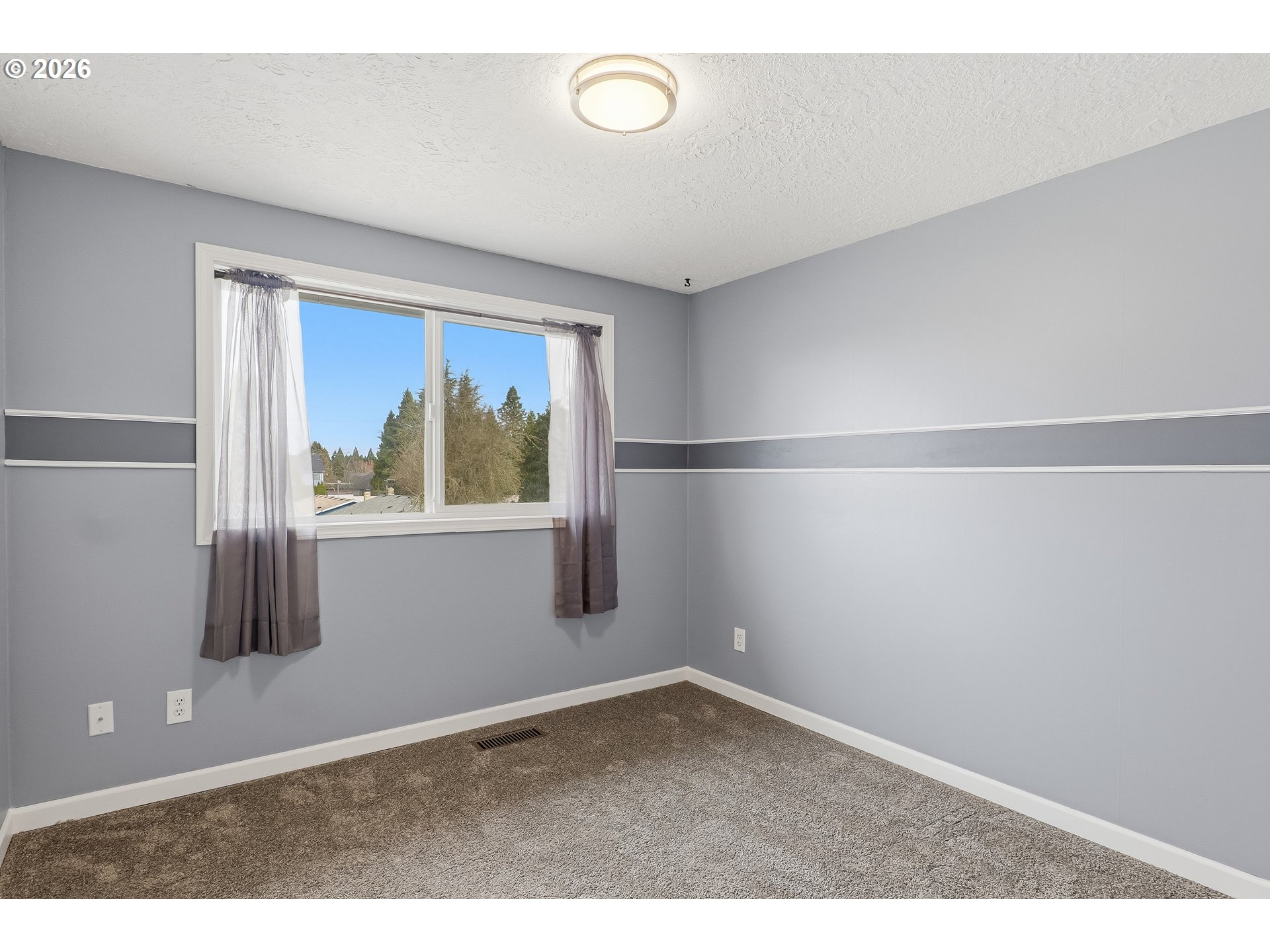 818 Chehalis Place North Keizer, OR 97303 - Photo 10 of 20 a view of empty room with window