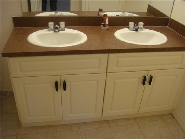 22465 Southwest 61st Way, Unit 243D Boca Raton, FL 33428 - Photo 2 of 10 a bathroom with a sink and a mirror