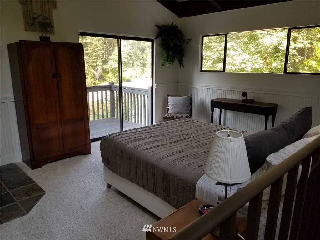 53718 State Rte 2 Gold Bar, WA 98251 - Photo 12 of 32 a bedroom with a bed and a large window