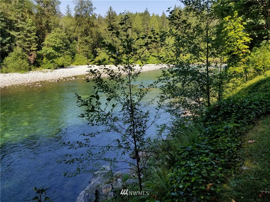 53718 State Rte 2 Gold Bar, WA 98251 - Photo 27 of 32 a view of a lake with large trees