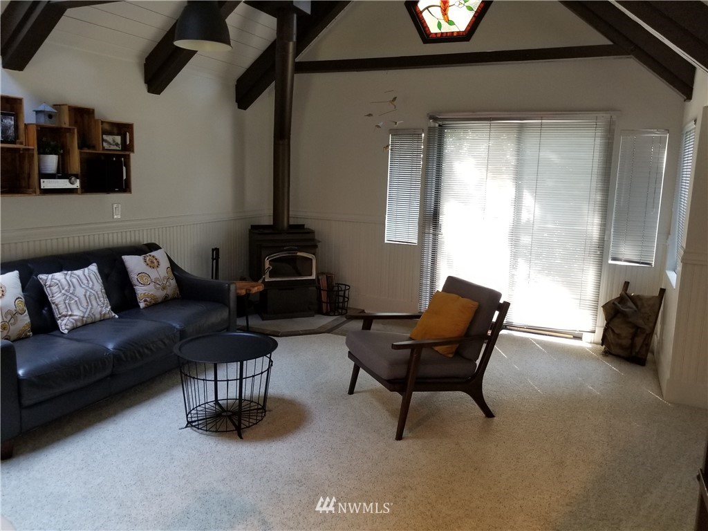 53718 State Rte 2 Gold Bar, WA 98251 - Photo 7 of 32 a living room with furniture and a fireplace