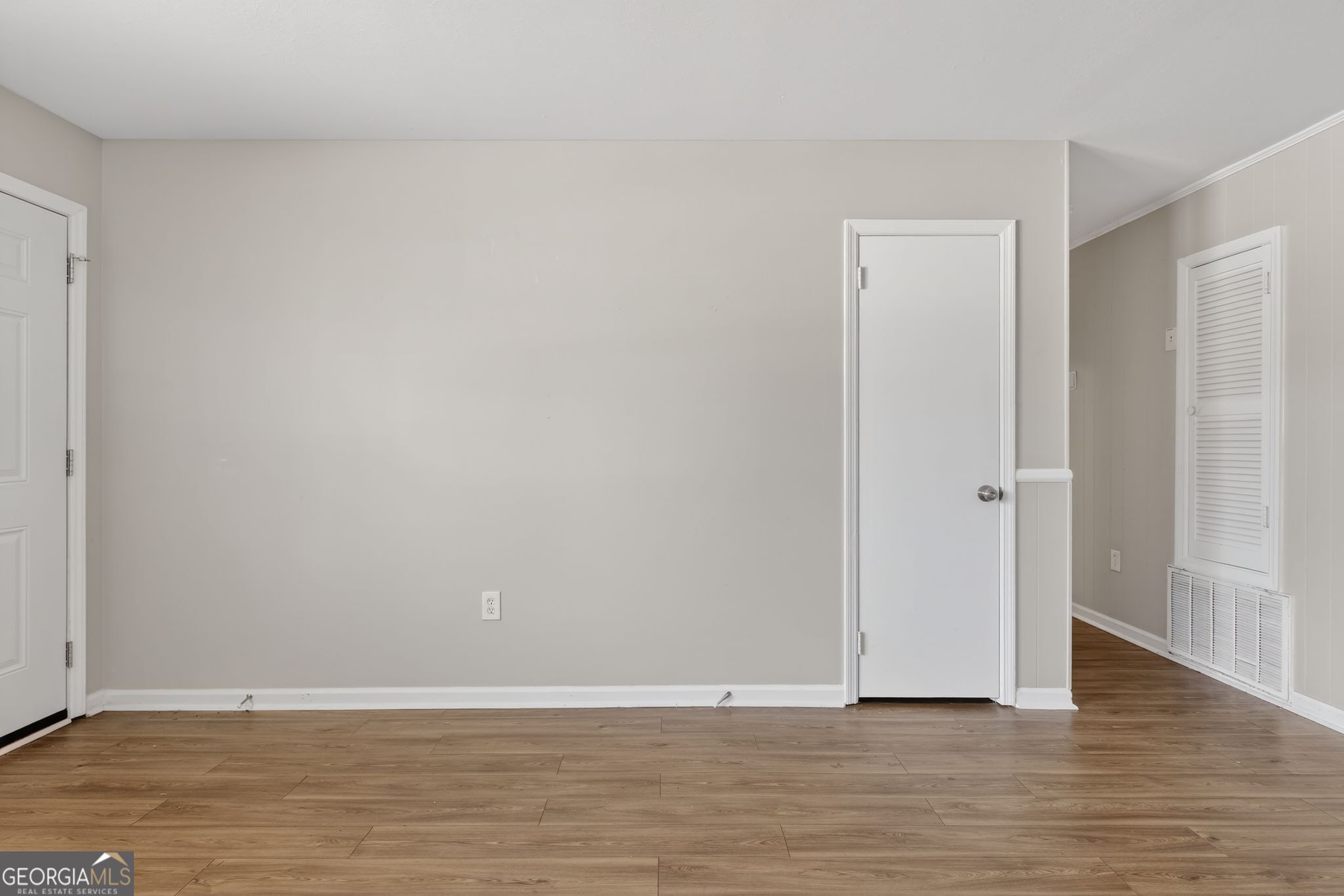 2508 Dexter Road Augusta, GA 30906 - Photo 23 of 33 a view of an empty room with wooden floor and a window