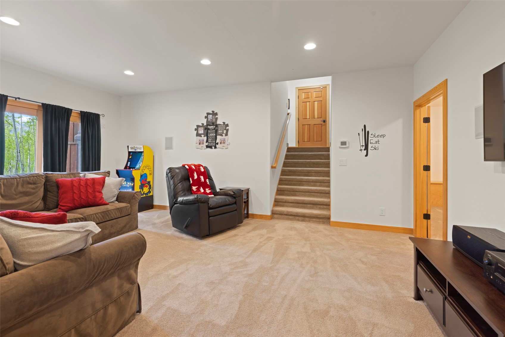 736 Wild Rose Road Silverthorne, CO 80498 - Photo 34 of 49 Living area with recessed lighting, stairs, and light colored carpet