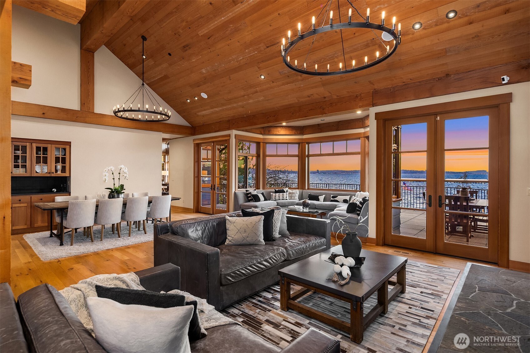 7010 North Mercer Way Mercer Island, WA 98040 - Photo 8 of 40 a living room with furniture a rug and a large window