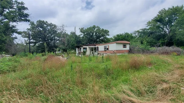 a house view with a outdoor space