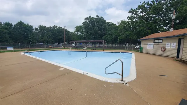 swimming pool view with a outdoor space