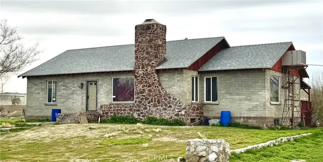 a house view with a swimming pool