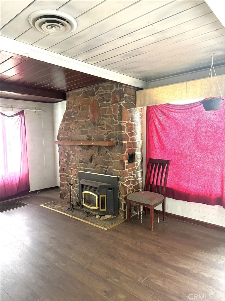 19859 Anahola Road Barstow, CA 92311 - Photo 5 of 14 a room with furniture and a fireplace